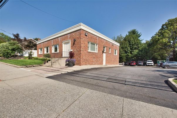 Exterior, Facade, Brick Facade, Condo Building