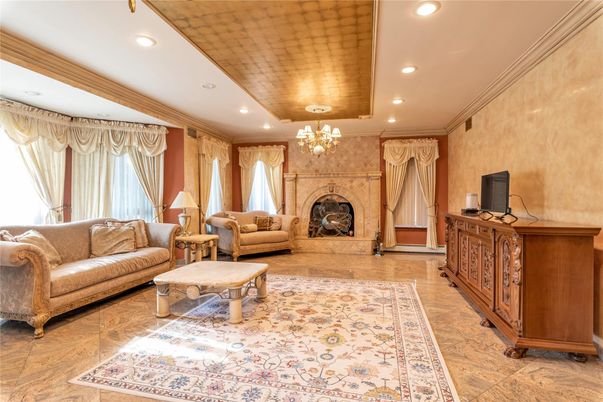 Chandelier, Fireplace, Interior, Living room, Recessed Lighting, Wood Texture Flooring