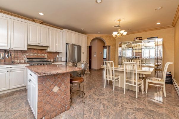 Chandelier, Dining room, Interior, Kitchen, Recessed Lighting, Stainless Steel Appliances