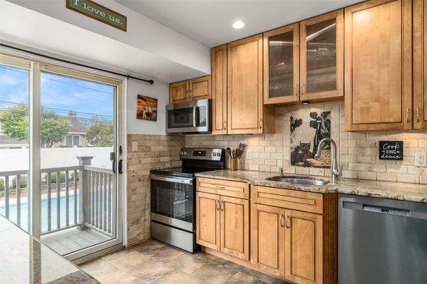 Interior, Kitchen, Recessed Lighting, Stainless Steel Appliances, Stone Walls