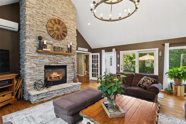 Fireplace, Interior, Living room, Pendant Lights, Stone Walls, Wood Texture Flooring