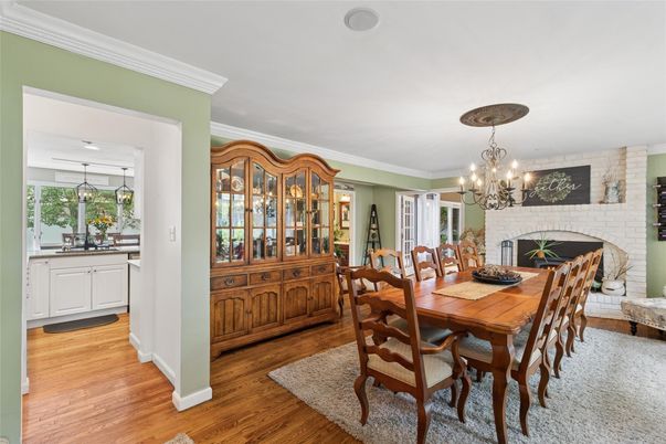 Chandelier, Dining room, Fireplace, Interior, Stone Walls, Wood Texture Flooring