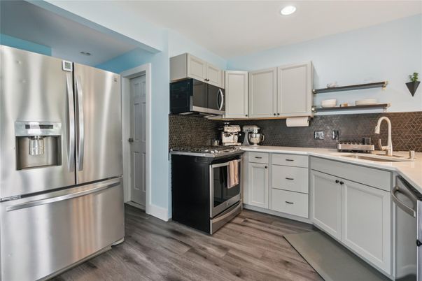 Interior, Kitchen, Recessed Lighting, Stainless Steel Appliances, Wood Texture Flooring