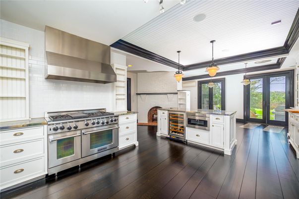 Interior, Kitchen, Pendant Lights, Stainless Steel Appliances, Stone Walls, Wood Texture Flooring