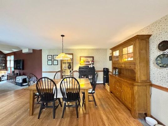 Dining room, Fireplace, Interior, Pendant Lights, Wood Texture Flooring