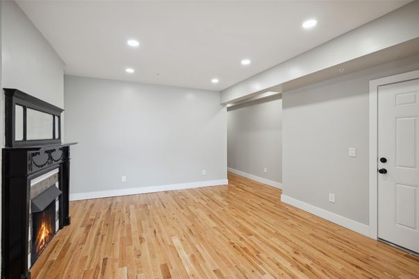 Empty room, Fireplace, Interior, Recessed Lighting, Wood Texture Flooring
