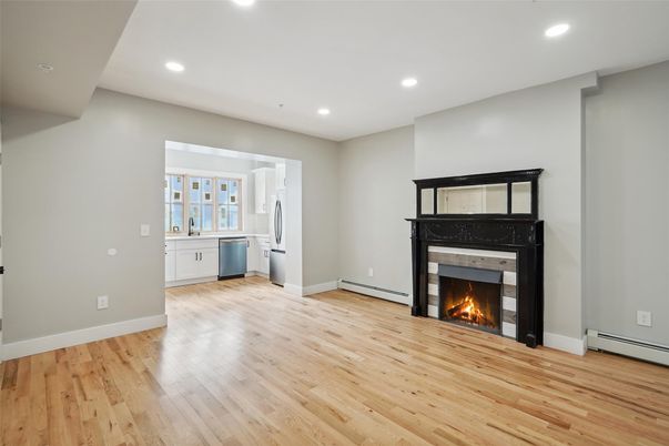 Empty room, Fireplace, Interior, Kitchen, Recessed Lighting, Wood Texture Flooring