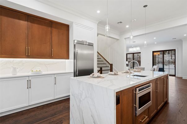 Interior, Kitchen, Marble Walls, Pendant Lights, Recessed Lighting, Stainless Steel Appliances, Wood Texture Flooring
