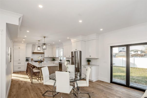 Dining room, Interior, Kitchen, Pendant Lights, Recessed Lighting, Stainless Steel Appliances, Wood Texture Flooring