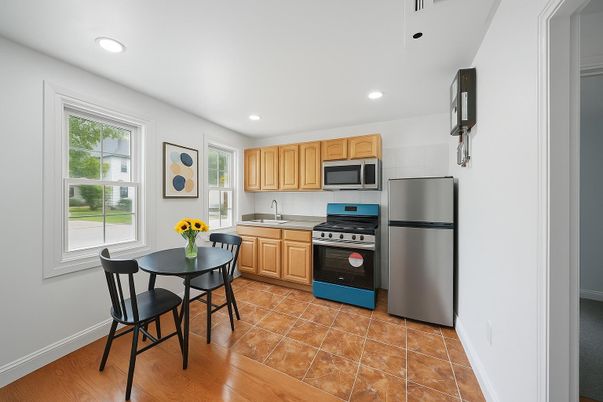 Dining room, Interior, Kitchen, Recessed Lighting, Stainless Steel Appliances, Wood Texture Flooring