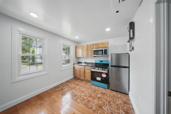 Interior, Kitchen, Recessed Lighting, Stainless Steel Appliances, Wood Texture Flooring