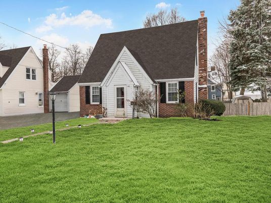 Attached, Backyard, Detached Garage, Exterior, Facade, Brick Facade, Cape Cod
