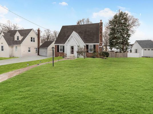 Attached, Backyard, Detached Garage, Exterior, Facade, Brick Facade, Cape Cod