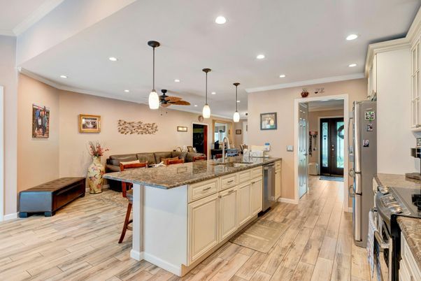 Interior, Kitchen, Pendant Lights, Recessed Lighting, Stainless Steel Appliances, Wood Texture Flooring