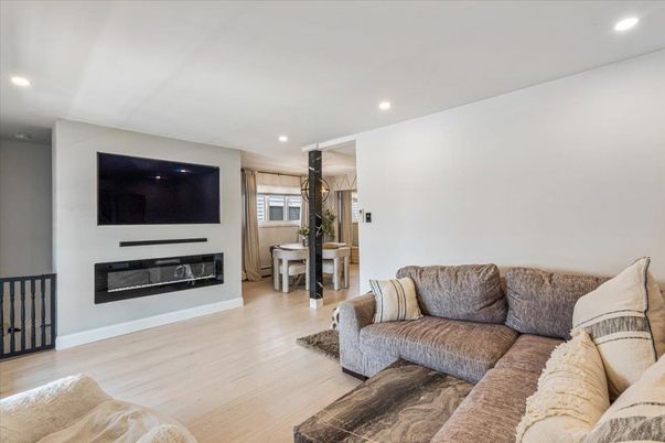 Fireplace, Interior, Living room, Recessed Lighting, Wood Texture Flooring