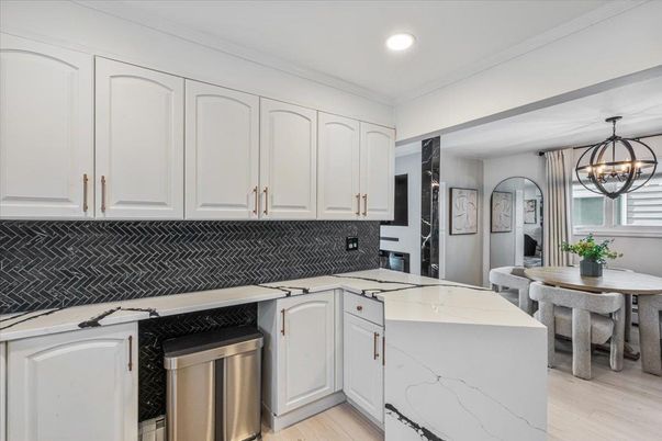 Chandelier, Dining room, Interior, Kitchen, Recessed Lighting, Stainless Steel Appliances, Wood Texture Flooring