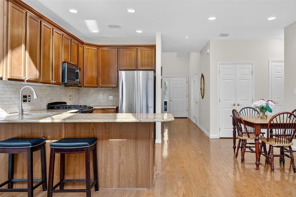 Dining room, Interior, Kitchen, Recessed Lighting, Stainless Steel Appliances, Wood Texture Flooring