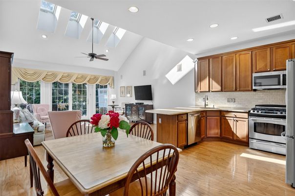Dining room, Interior, Kitchen, Recessed Lighting, Stainless Steel Appliances, Wood Texture Flooring