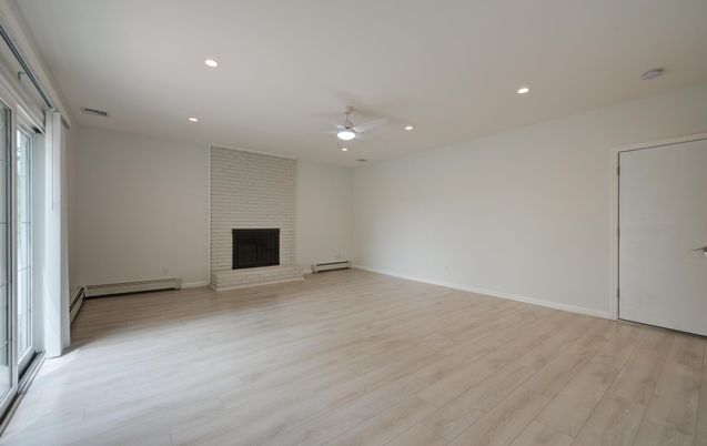 Empty room, Fireplace, Interior, Recessed Lighting, Wood Texture Flooring