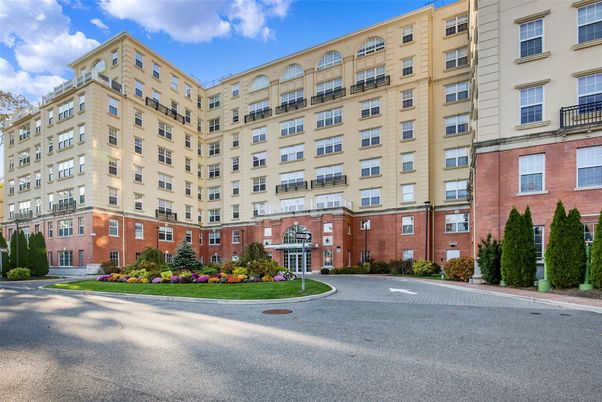 Exterior, Facade, Brick Facade, Condo Building