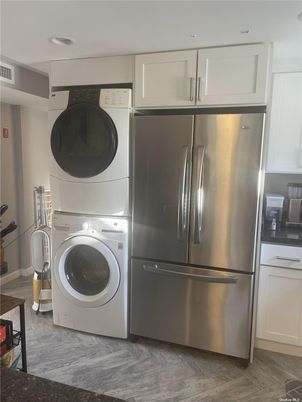 Interior, Kitchen, Recessed Lighting, Stainless Steel Appliances, Utility Closets, Washer, Wood Texture Flooring