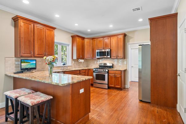 Interior, Kitchen, Recessed Lighting, Stainless Steel Appliances, Wood Texture Flooring