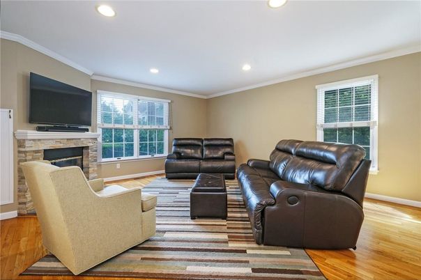 Fireplace, Interior, Living room, Recessed Lighting, Wood Texture Flooring
