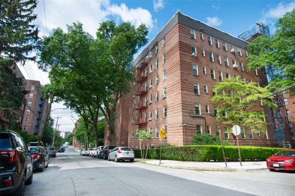 Exterior, Facade, Brick Facade, Condo Building