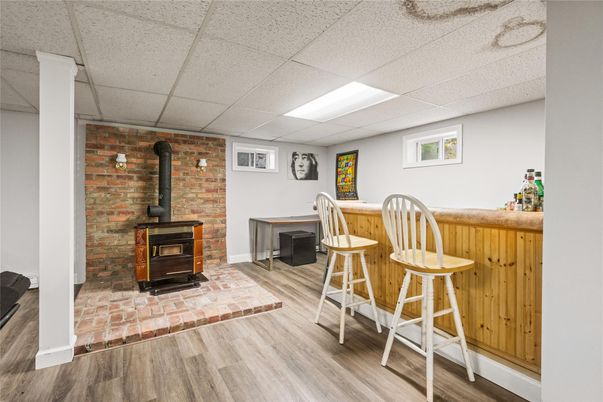 Fireplace, Interior, Recessed Lighting, Stone Walls, Wood Texture Flooring