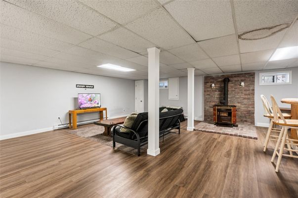 Fireplace, Interior, Recessed Lighting, Stone Walls, Wood Texture Flooring
