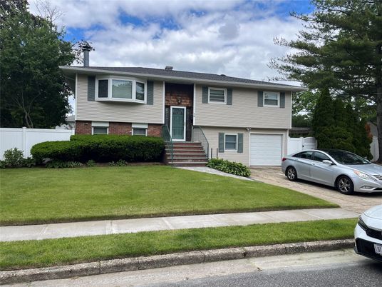 Attached, Exterior, Facade, Brick Facade, Raised Ranch