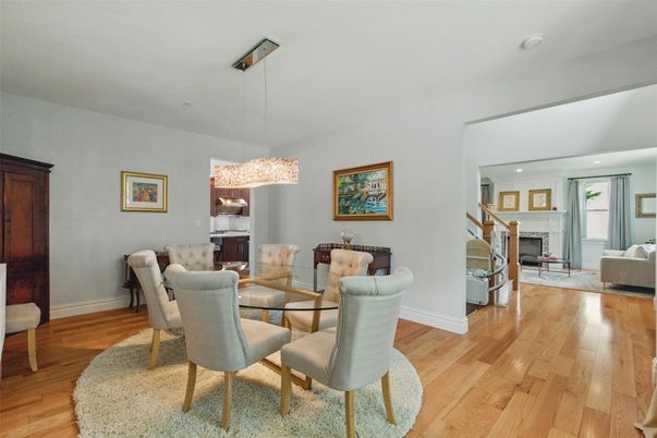 Dining room, Fireplace, Interior, Living room, Pendant Lights, Recessed Lighting, Wood Texture Flooring