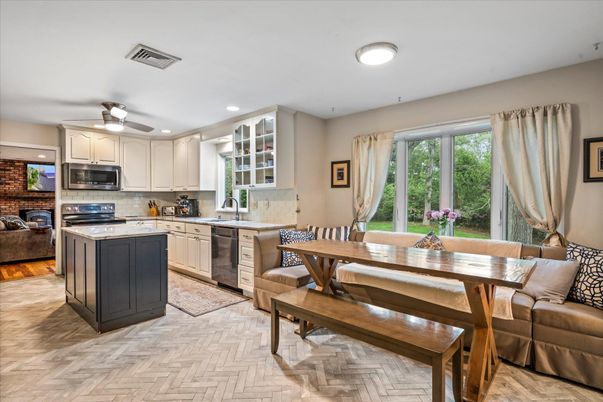 Dining room, Interior, Kitchen, Living room, Recessed Lighting, Stone Walls, Wood Texture Flooring