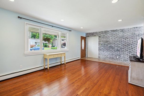 Empty room, Interior, Recessed Lighting, Stone Walls, Wood Texture Flooring