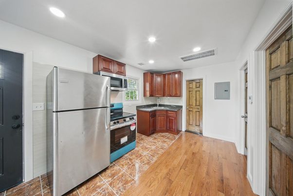Interior, Kitchen, Recessed Lighting, Stainless Steel Appliances, Wood Texture Flooring