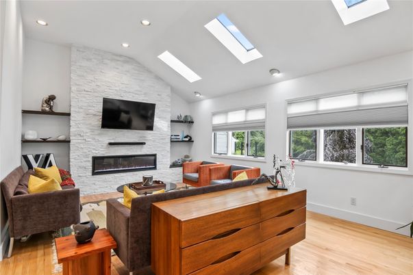 Fireplace, Interior, Living room, Recessed Lighting, Stone Walls, Wood Texture Flooring