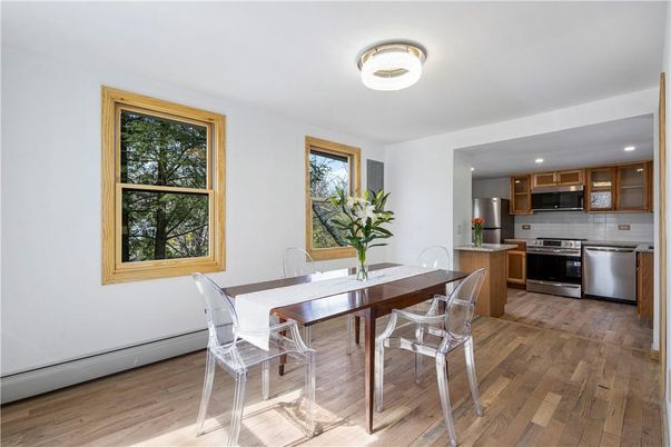 Dining room, Interior, Kitchen, Recessed Lighting, Stainless Steel Appliances, Wood Texture Flooring
