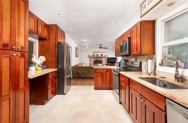 Fireplace, Interior, Kitchen, Living room, Recessed Lighting, Stainless Steel Appliances