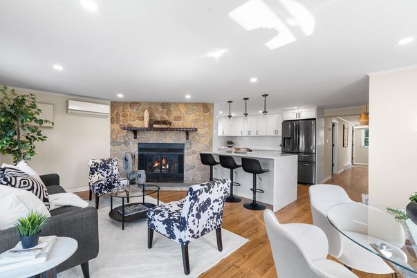 Dining room, Fireplace, Interior, Kitchen, Living room, Pendant Lights, Recessed Lighting, Stainless Steel Appliances, Stone Walls, Wood Texture Flooring