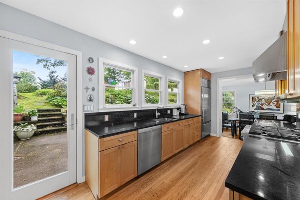 Dining room, Interior, Kitchen, Recessed Lighting, Stainless Steel Appliances, Wood Texture Flooring