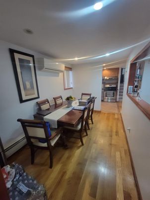 Dining room, Interior, Kitchen, Recessed Lighting, Stainless Steel Appliances, Wood Texture Flooring