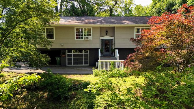 Attached, Exterior, Facade, Raised Ranch
