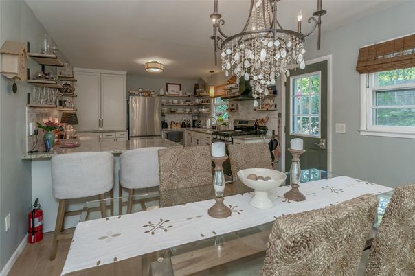 Chandelier, Dining room, Interior, Kitchen, Stainless Steel Appliances, Wood Texture Flooring