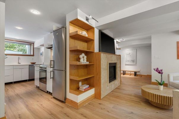Fireplace, Interior, Kitchen, Recessed Lighting, Stainless Steel Appliances, Wood Texture Flooring