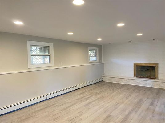 Empty room, Fireplace, Interior, Recessed Lighting, Wood Texture Flooring