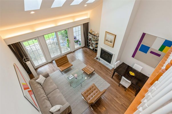 Dining room, Fireplace, Interior, Living room, Recessed Lighting, Wood Texture Flooring