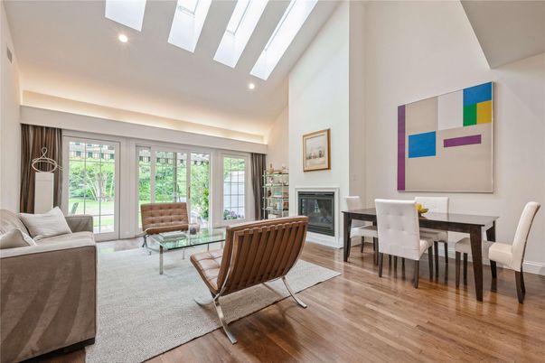 Dining room, Fireplace, Interior, Living room, Recessed Lighting, Wood Texture Flooring