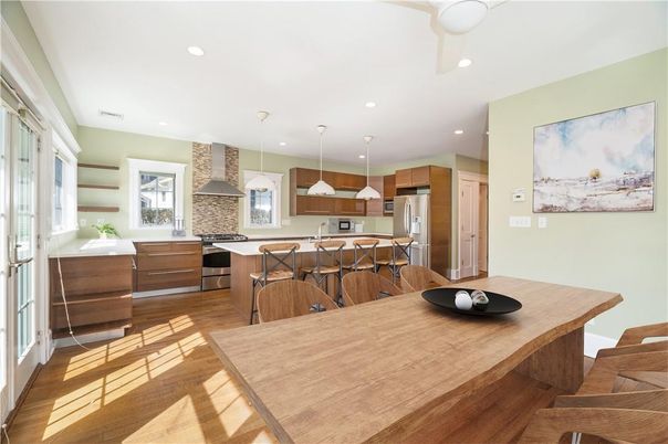 Interior, Kitchen, Pendant Lights, Recessed Lighting, Stainless Steel Appliances, Stone Walls, Wood Texture Flooring