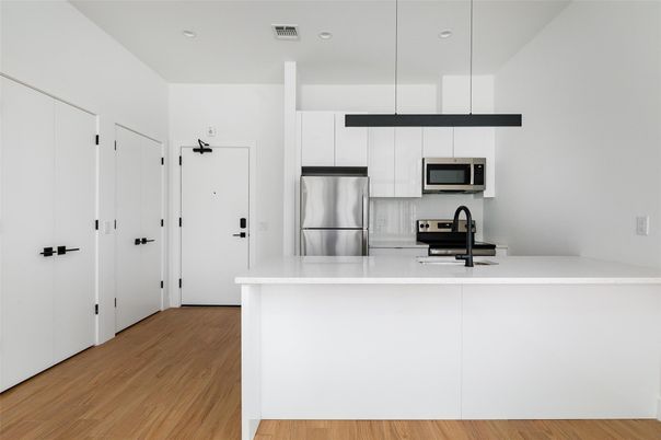 Interior, Kitchen, Pendant Lights, Recessed Lighting, Stainless Steel Appliances, Wood Texture Flooring