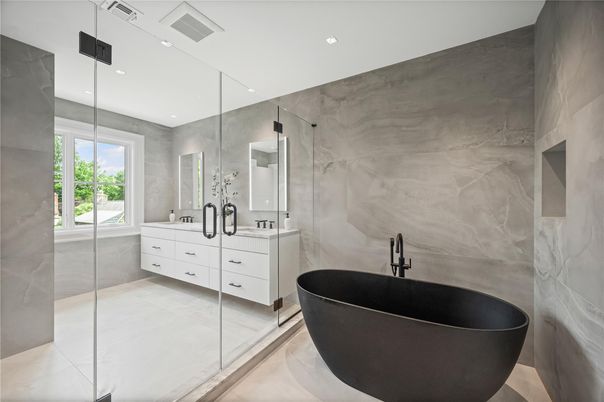Bathroom, Dual Sink Vanities, Free Standing Baths, Glass Shower, Interior, Marble Walls, Recessed Lighting